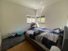 Großzügige 3-Zimmer-Wohnung im Staffelgeschoss mit toller Terrasse in Sonnenlage - Schlafzimmer mit Blick ins Grüne