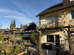Terrassen EG - Gepflegtes Mehrfamilienhaus mit traumhaftem Grundstück in toller Lage von Saarn