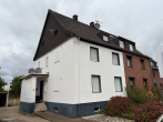 Vorderansicht - Sanierungsbedürftige Doppelhaushälfte auf großem Grundstück in Toplage von Korschenbroich