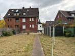 Blick aus dem Garten - Sanierungsbedürftige Doppelhaushälfte auf großem Grundstück in Toplage von Korschenbroich